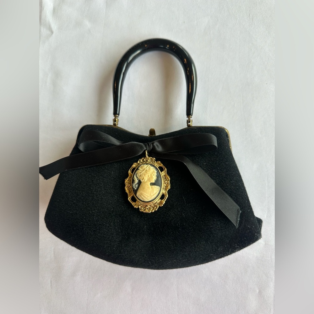 Vintage-Inspired Black Mini Handbag with Cameo Accent